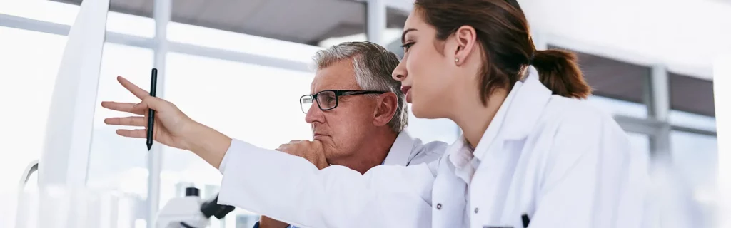 physicians reviewing medical coding